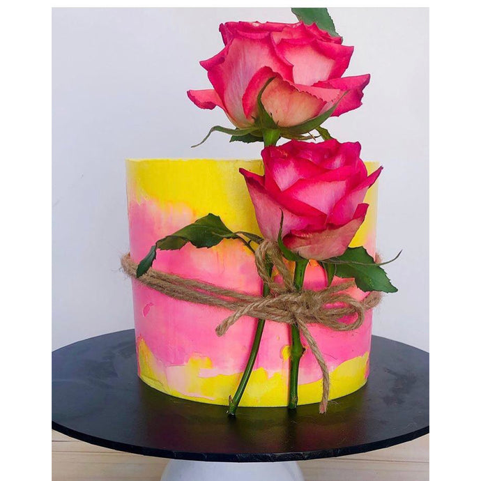 abstract cake, custom cakes, real flower, pink and yellow coloured cake